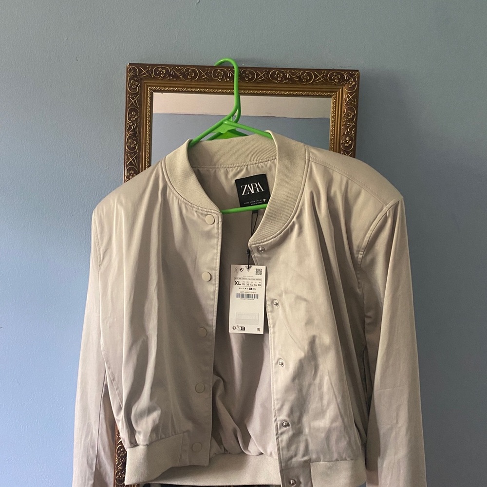 Cream bomber jacket